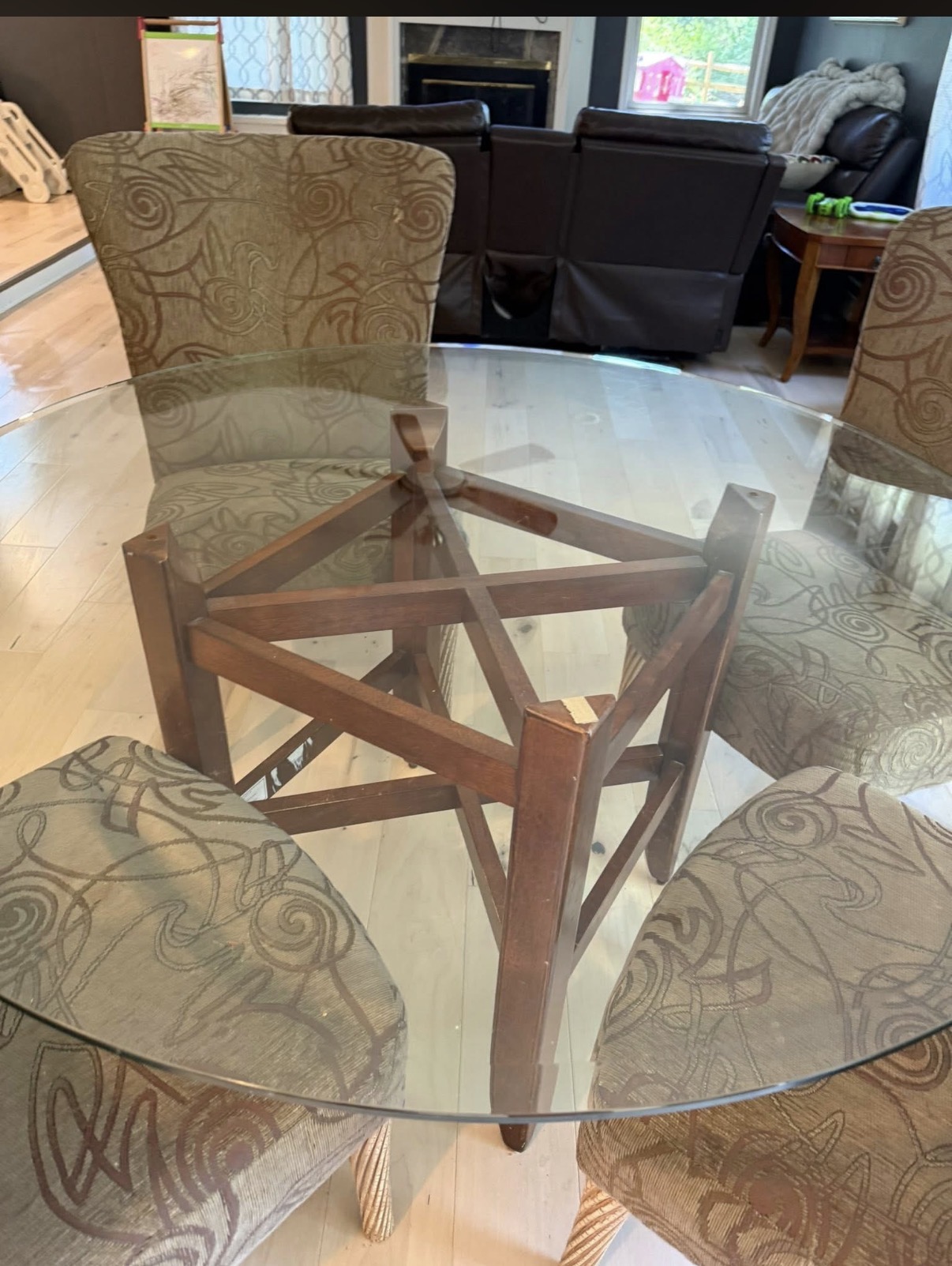Crystal-clear glass dining table after cleaning