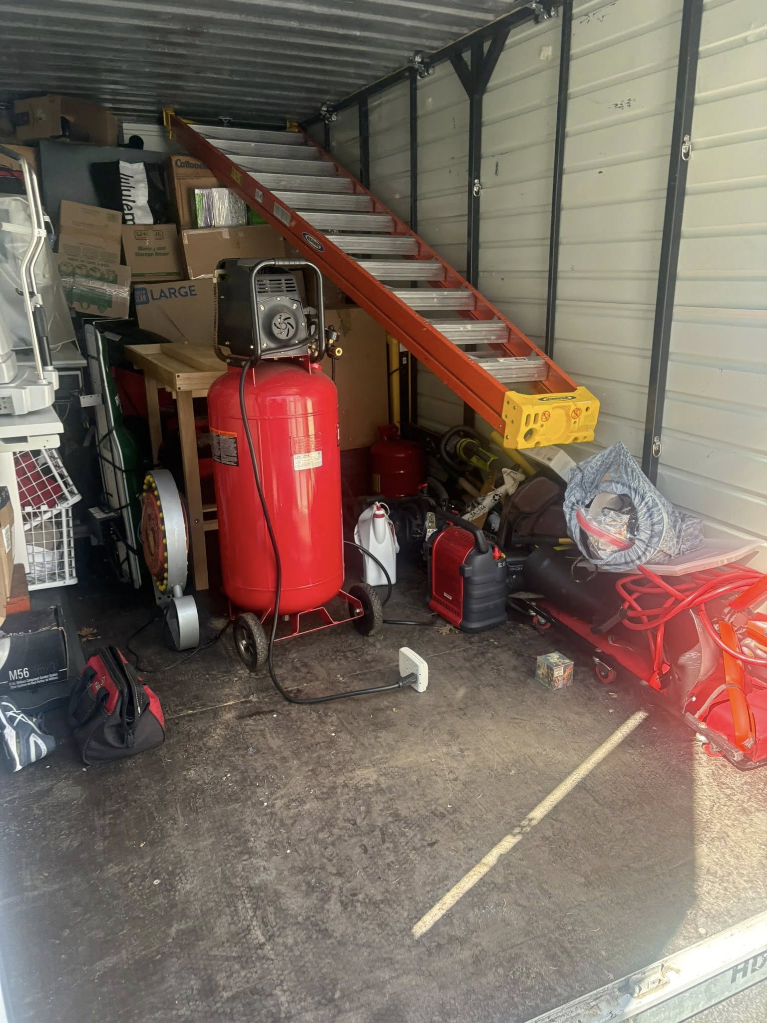 Disorganized garage before cleaning
